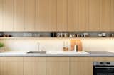Kitchen, Wood Cabinet, Stone Counter, Cooktops, and Drop In Sink  Photo 2 of 15 in Apartment M8 by Igor Marasovic