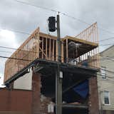 Top two floors do not sit on the original brick