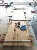 Making the kitchen surround onsite from the reclaimed floor joists
