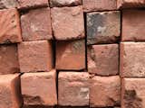 Hand cut brick to create our own thin brick