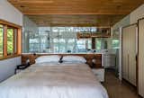 Bedroom, Bed, Recessed Lighting, and Concrete Floor  Photo 4 of 10 in Kawartha Lakes Cottage by Sustain Design Architects Inc.