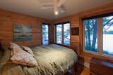 Bedroom, Bed, and Medium Hardwood Floor  Photo 16 of 20 in Kasshabog Lake Cottage by Sustain Design Architects Inc.