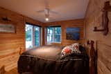 Bedroom, Medium Hardwood Floor, and Bed  Photo 17 of 20 in Kasshabog Lake Cottage by Sustain Design Architects Inc.