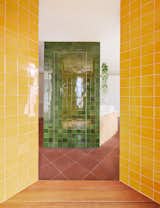 Bath Room, Ceramic Tile Wall, Wall Lighting, Freestanding Tub, Open Shower, Terrazzo Floor, Drop In Sink, and Marble Counter inside the shower looking the bathroom. original floor, catalan ceramic tiles from ferrés  Photo 5 of 27 in Tangram house by twobo arquitectura