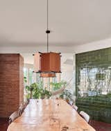 the dinning room with the mvv lamp from marset, a design of Manuel Valls from 1970