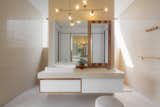 master bathroom vanity with natural light & air ventilation