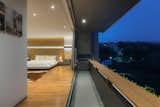 master bedroom & balcony with a view