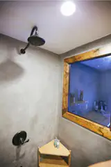The one way mirror also makes the small bathroom area feel larger than it actually is.