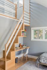 The children's bedrooms all have some sort of nook or space that is special. This room has a custom built-in staircase up to a reading nook. 