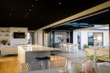 Main family living area.  Striking black feature ceiling.
