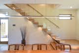 Staircase, Wood Tread, and Glass Railing Mount Pleasant Modern: Stairs  Photo 10 of 10 in Mount Pleasant Modern by Rush Dixon Architects