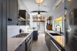 Kitchen and Undermount Sink  Photo 3 of 18 in Gulf Island Tiny Home by James Alfred Photography