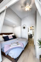 Bedroom, Bed, Ceiling Lighting, and Wardrobe  Photo 16 of 18 in Gulf Island Tiny Home by James Alfred Photography