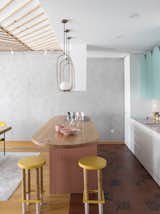 Dining Room, Table, Bar, Stools, and Chair  Photo 20 of 43 in Chunky Finishes Combine With Curves in This Easter-Egg Colored Apartment by MUZA