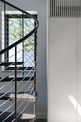 Staircase, Metal Tread, Cable Railing, and Metal Railing  Photo 9 of 18 in Huron Studio by YR Architecture + Design