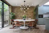 I used the old bricks inside to bring the outside in. My husband is Australian and I am very much inspired by how Australians blur the lines between indoors and out.