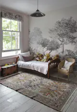 Our daughter's room follows a forest theme. The colour palette was taken from the vintage rug we brought back from our trip to Turkey.