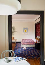 Bedroom, Night Stands, Ceiling Lighting, Bed, and Medium Hardwood Floor  Photo 7 of 15 in Pied-a-Terre by Casework Interior Design