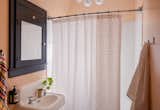 Bath Room, Ceiling Lighting, Full Shower, and Wall Mount Sink  Photo 15 of 15 in Pied-a-Terre by Casework Interior Design