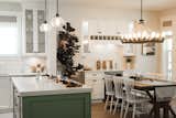 Generous kitchens include large islands perfect for family and friends to gather around.   Photo 4 of 17 in Creekside Mills agrihood blooms near Cultus Lake by Carly Clements