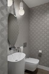 Powder Room with modern pedestal sink and vinyl wallpaper