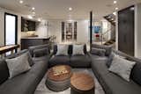 Basement Family Room - U shaped sectional, custom shuffleboard, wine room, kitchenette, light well, home office