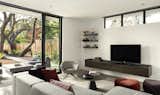 Family Room with floating media cabinet and shelving