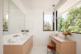 Primary Bathroom double vanity with dressing make up table