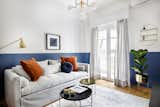 Living Room, Ceiling Lighting, Sofa, and Coffee Tables Living room  Photo 2 of 16 in Small eclectic apartment in Koukaki, Athens by 3NK Engineers & Architects