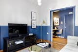 Living Room, Coffee Tables, End Tables, Ceiling Lighting, Floor Lighting, Chair, and Medium Hardwood Floor Living room  Photo 4 of 16 in Small eclectic apartment in Koukaki, Athens by 3NK Engineers & Architects