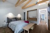 Bedroom, Pendant Lighting, and Medium Hardwood Floor  Photo 15 of 25 in CMMT HOUSE by rucsandra popescu