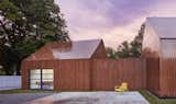 The house includes a 500 sf accessory dwelling that is attached to the primary house by a storage shed  Photo 7 of 24 in 722 Ash Street House by Studio 804 by DAVID SAIN