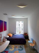 Bedroom, Accent Lighting, Medium Hardwood Floor, Bed, Recessed Lighting, and Chair Bedroom  Photo 7 of 9 in Gramercy Park Townhouse by Shilpa Patel