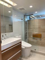 Bath Room, Undermount Sink, Ceramic Tile Floor, Recessed Lighting, Open Shower, Engineered Quartz Counter, Ceiling Lighting, Two Piece Toilet, and Glass Tile Wall Lower Bath  Photo 9 of 10 in Holman House by Shawn Bradbury