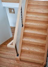 Staircase, Metal Railing, Wood Railing, and Wood Tread Stair  Photo 14 of 21 in OKC Farmhouse by Scharbach Workshop