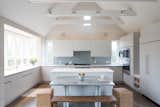 Kitchen, Subway Tile Backsplashe, White Cabinet, and Engineered Quartz Counter  Photo 6 of 8 in Kitchen Design by Wettling Architects