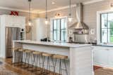 A modern kitchen and updated baths provide the perfect spaces for entertainment and relaxation.   Photo 4 of 11 in Be Your Own Brewmaster in this North Carolina Farmhouse on Tap for $3.4 Million by Premier Sotheby's International Realty