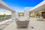 Outside, multiple sun decks, a saltwater pool and several reflection pools are set against the breathtaking backdrop of Sarasota Bay. A boat dock and lift provide direct water access; on the Gulf side of the property, a private beach awaits.