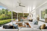 Living Room, Sofa, Coffee Tables, Ceiling Lighting, Sectional, and Lamps  Photo 10 of 35 in The Banyan Beach House Asks a Breezy $3.6 Million by Premier Sotheby's International Realty