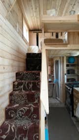Staircase with a regular gait and banister.  Easy strides up and down.