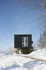 Tremblant ski chalet cantilevered master bedroom with covered entrance