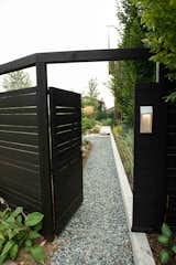 Entrance into the yard from parking area.