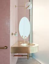 A brass sink makes a stylish statement.