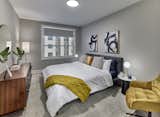 Thoughtful details, such as custom roller shade window treatments, are found throughout the homes. 