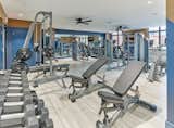 Residents enjoy a state-of-the-art fitness center with commercial-grade cardio and strength training equipment. 