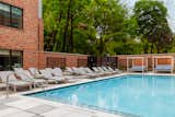 Outdoors, residents have access to 18,000 square feet of open-air amenities spanning three courtyards that feature a refreshing swimming pool, private cabanas, firepits, private BBQ dining, an outdoor movie lawn and a covered and heated outdoor lounge designed for year-round enjoyment.