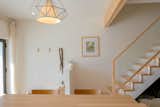 Staircase, Glass Railing, Wood Railing, and Wood Tread Clean and simple entryway.  Photo 18 of 25 in Radiance Cohousing by Shannon Dyck