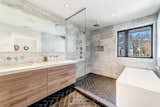 Owner's bathroom featuring wet room with soaking tub.