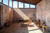 Casa do Lago brick living room