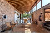 The interior of the social side of the home was made to feel like a communal pavilion, with all of the activities grouped in one fluid space and clerestory windows invoking an open-air aspect.